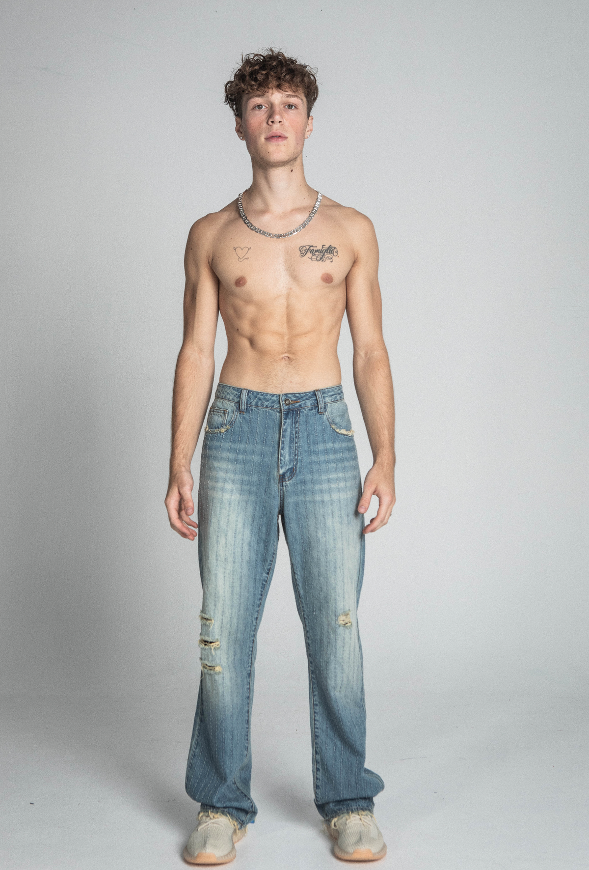 RIPPED BLUE THREAD LINE MID-RISE LOOSE JEANS