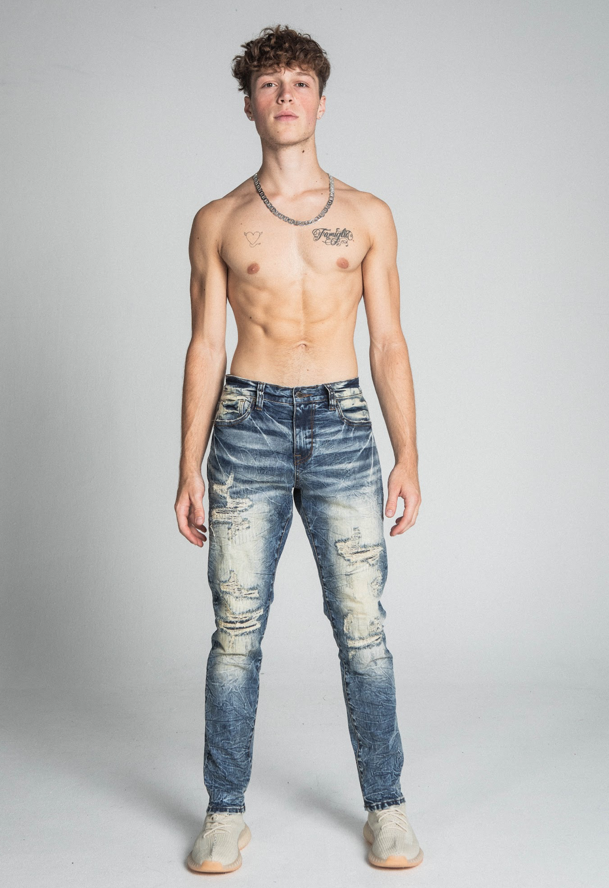 RIPPED MID-RISE VINTAGE SLIM JEANS