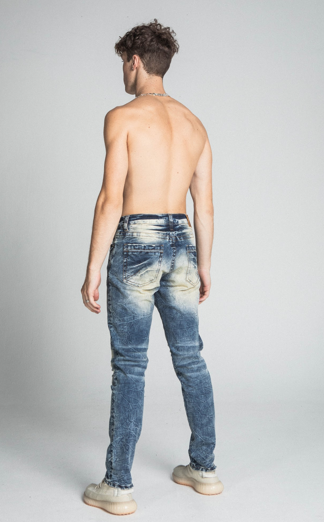 RIPPED MID-RISE VINTAGE SLIM JEANS