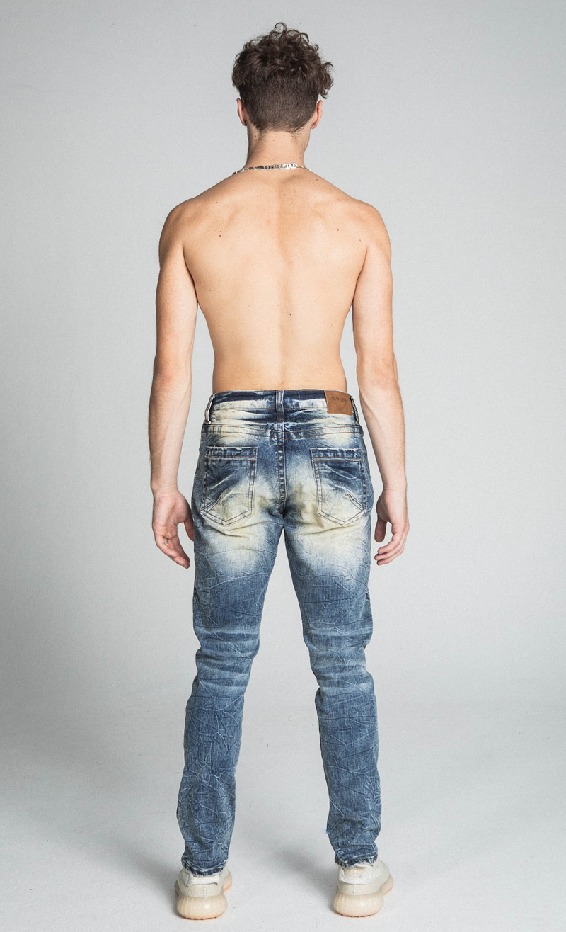 RIPPED MID-RISE VINTAGE SLIM JEANS