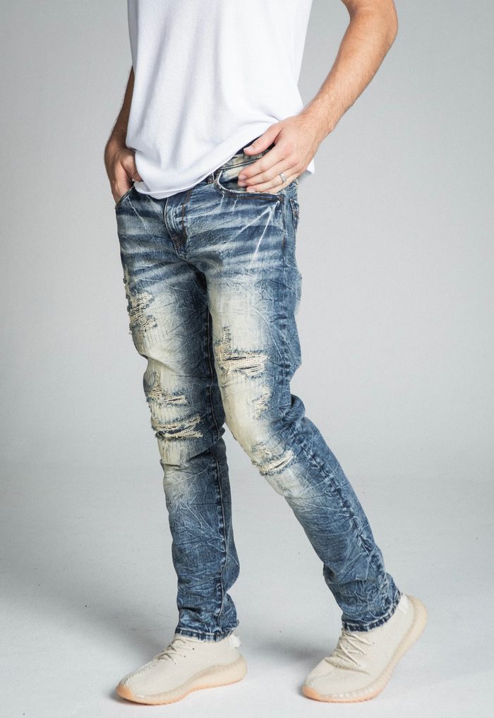 RIPPED MID-RISE VINTAGE SLIM JEANS